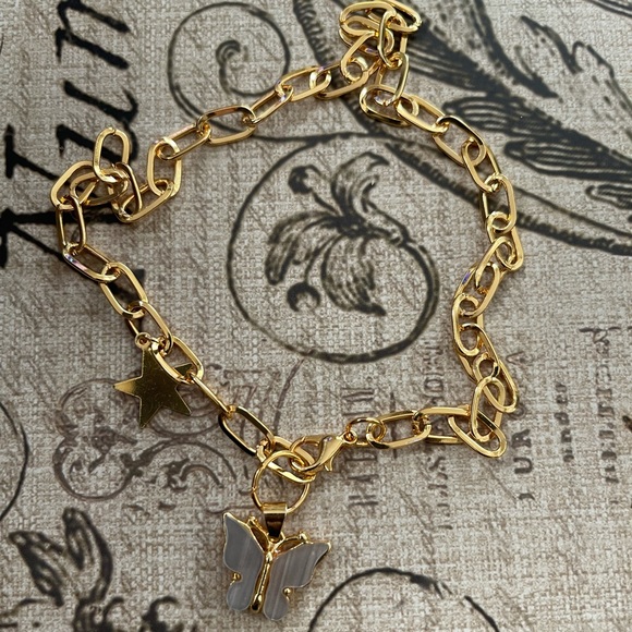 Taupe crystal butterfly & star charm paperclip gold tone necklace - Picture 4 of 8